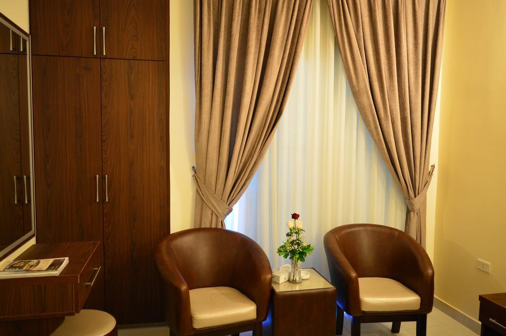 Ream Hotel Amman Zimmer foto