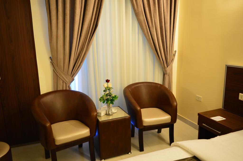 Ream Hotel Amman Zimmer foto